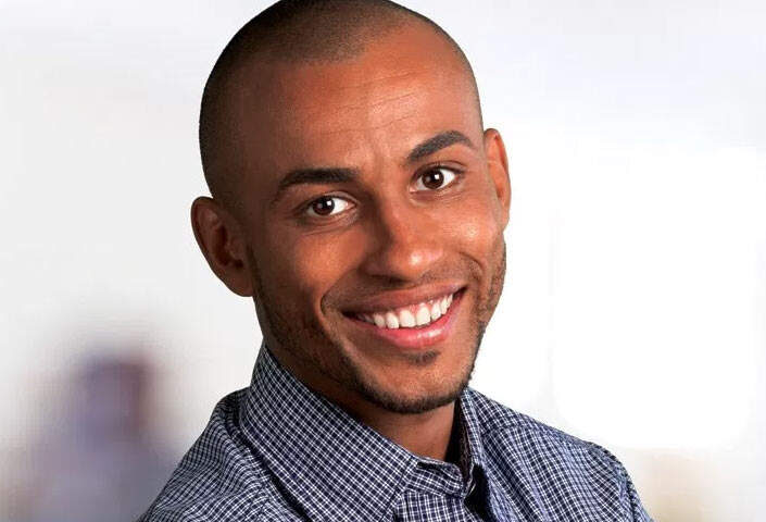 Confident Man Smiling | Dental Cleanings and Dental Exams in West Liberty, IA, North Liberty, IA and Muscatine, IA | Gentle Family Dentists