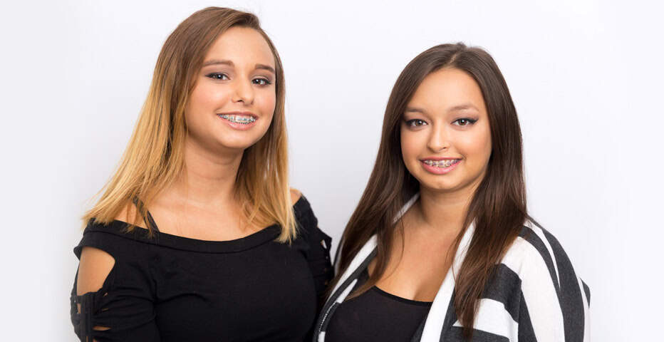 Healthy-looking women with traditonal braces | Orthodontics Treatment Options in Muscatine, IA | Gentle Family Dentists