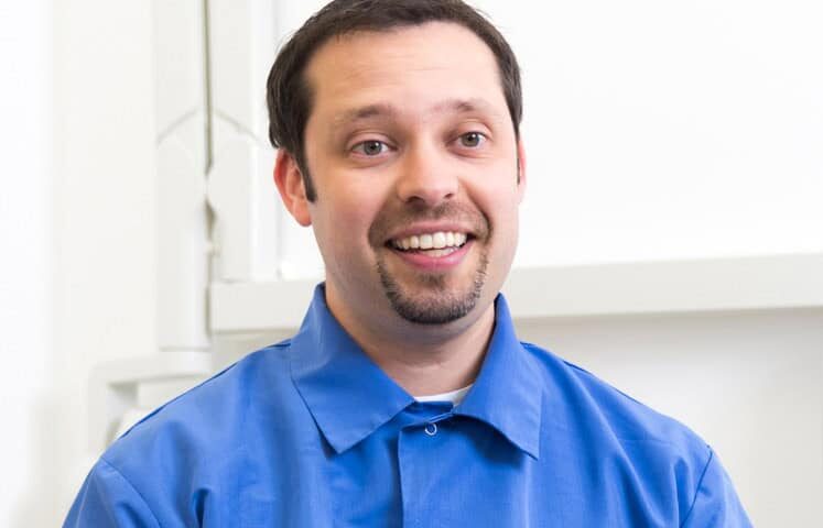 Dr. Roberto Moreno Talking to a dental patient | Tooth Fillings in West Liberty, IA, North Liberty, IA and Muscatine, IA | Dr. Carol Moreno