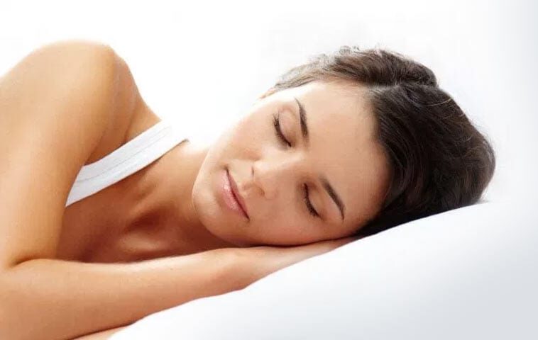 Sleep Apnea TYoung Woman Sleeping Peacefully | Sleep Apnea Treatment in West Liberty, IA | Gentle Family Dentistsreatment in West Liberty, IA | Gentle Family Dentists